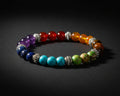 7 Chakra Tuerkis Yoga Armband mit bunten Natursteinen und silbernen Zwischenperlen