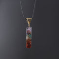 7 Chakra Edelstein Anhaenger mit Natursteinsplittern und Kupferspirale an schwarzer Halskette